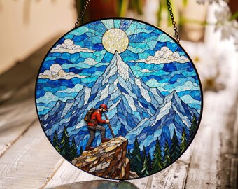 hiker under mountain sun stained glass style suncatcher for nature lovers spiritual seekers and adventure gift