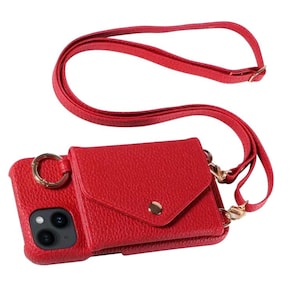 May include: A red leather phone case with a small wallet attached and a long red strap.