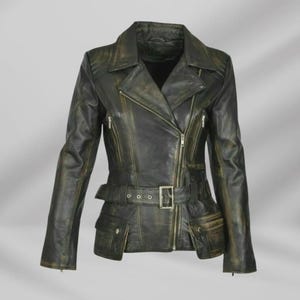 May include: A distressed black leather jacket with a belted waist, asymmetrical zipper, and multiple pockets. The jacket has a vintage, worn appearance with a faded green hue in areas. The collar is a classic notched style.