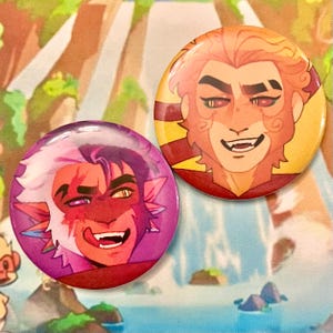 May include: Two round, colorful buttons featuring stylized character portraits. One button has a purple background with a character in shades of red and white. The other button has an orange background with a character in shades of orange and red.