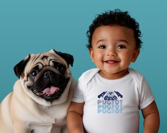 May include: A white short-sleeved baby bodysuit featuring a graphic of a pug face and the text PUGTOT repeated three times in descending shades of blue. The garment is worn by a smiling infant positioned next to a tan pug dog with a black face.
