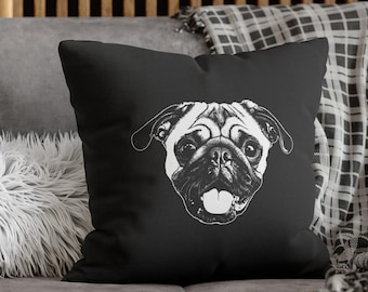 May include: A square black throw pillow featuring a centred white line art illustration of a pug dog face. The pug is depicted with its tongue hanging out, large round eyes, and detailed facial wrinkles, creating a high-contrast graphic design.