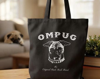 May include: A black tote bag featuring a white graphic print of a pug wearing a studded collar. The text OMPUG is printed above the dog, and the text the Original Punk Rock Breed is printed below the dog in a white, distressed font style.