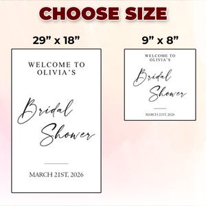 May include: Two white signs with black text for a bridal shower. The larger sign is 29" x 18" and the smaller sign is 9" x 8". Both signs read "Welcome to Olivia's Bridal Shower, March 21st, 2026."
