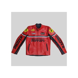 May include: Red leather racing jacket with black accents and the Ferrari logo. Features "RACING" on the sleeves and various patches, including "devil" and "Bell Helmets". A classic racing-inspired design.
