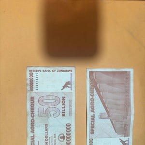 Billions and hundreds of millions notes! Like hyperinflationary post WWII Weimar Germany, these Zimbabwe notes are a novel and fun keepsake.