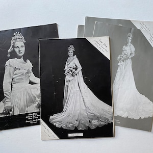 May include: Black and white photo of two women wearing gowns and crowns. The photo is from a "Rose Day" event at the College of Saint Rose in Albany, New York.