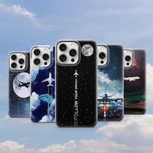 May include: Five different iPhone cases with a space and airplane theme. The cases are black, blue, white, and gray with different designs. One case says "Follow Your Dreams".