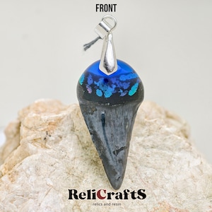 Fossilized shark tooth with resin (Clear blue)
