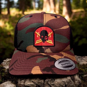 THE Carlsons Raider Trucker Cap