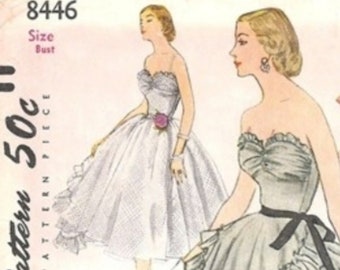 1950's Strapless Ball Gown with Fitted Bodice and Full Skirt in Short or Floor Lengths  Thin Straps are also included.  Bust 32
