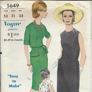 May include: Vintage Vogue sewing pattern number 5649 for a dress. The pattern includes instructions for making a green dress with a belt and a black sleeveless dress. The pattern is labelled "Easy to Make" and costs £100.