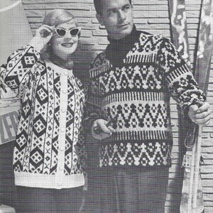 May include: A black and white patterned cardigan and sweater are worn by a woman and a man. The woman wears cat-eye sunglasses. The sweater and cardigan have a geometric design. The man holds skis.