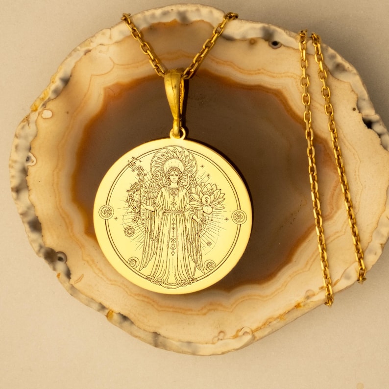 This Gold Plated Archangel Jophiel Necklace represents wisdom, illumination, and divine beauty. Crafted in gold plated 925 sterling silver, this pendant channels the energy of Archangel Jophiel, symbolizing mental clarity, spiritual enlightenment, and inner beauty. Ideal for those seeking spiritual growth, creative empowerment, and personal transformation. Perfect as a gift or personal talisman for those on a journey of enlightenment and inner wisdom.