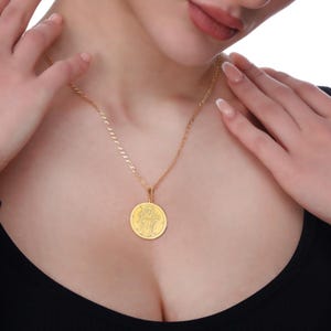 This Gold Plated Archangel Jophiel Necklace represents wisdom, illumination, and divine beauty. Crafted in gold plated 925 sterling silver, this pendant channels the energy of Archangel Jophiel, symbolizing mental clarity, spiritual enlightenment, and inner beauty. Ideal for those seeking spiritual growth, creative empowerment, and personal transformation. Perfect as a gift or personal talisman for those on a journey of enlightenment and inner wisdom.