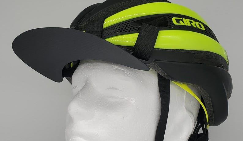 AERO bike helmet brim, my favorite helmet accessory. Three brim positions(left,right,center) easily stow in jersey for Aerodynic riding. :) magnetic bike helmet accessories by brimware