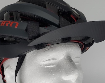 Lägg till ett brätte för att cykla på hjälmen med en AEROXBRIM från Brimware! Ta av och sätt på dig under cykling. Tre sollägen vänster, höger eller mitten.