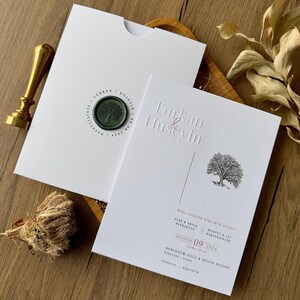 Custom Embossed Wedding Invitation: Handmade Seal, Elegant White Design