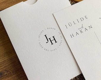 Textured Zenit Paper Wedding Invitation: Elegant White & Black Print