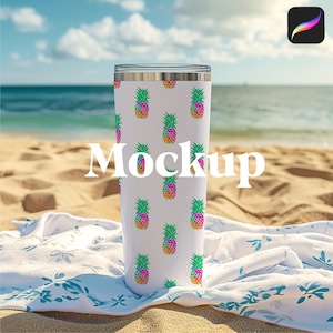 May include: A white travel mug featuring a repeating pattern of multi-coloured pineapples. The word "Mockup" is printed on the mug. The mug is on a beach towel with a blue and white design, with the sea and sky in the background.