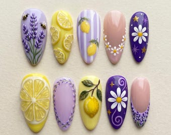 Uñas con diseño de lavanda y limón, uñas con diseño de cítricos en 3D, uñas con diseño floral de abeja y margarita, uñas veraniegas adorables, uñas con diseño de jardín caprichoso, uñas de primavera.