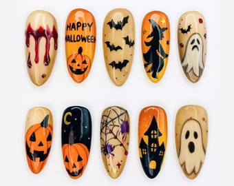 May include: A set of ten Halloween-themed nail art designs. Each nail features unique artwork, including dripping blood, jack-o'-lanterns, bats, a witch, a ghost, a spider web, and a haunted house. The nails are painted in orange, black, and beige.