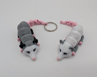 Juguete antiestrés de zarigüeya personalizable / Compañero de escritorio articulado o llavero