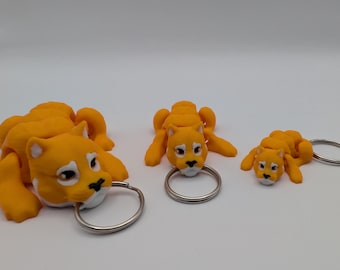 Juguete antiestrés de diente de sable personalizable / compañero de escritorio o llavero