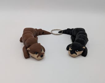 Juguete antiestrés de nutria personalizable / Compañero de escritorio articulado o llavero