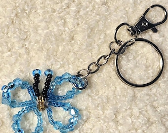 Llaveros/adornos para bolsos con forma de mariposa y cuentas