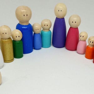 Constellation figures randomly mixed and colored (system therapy, table constellation, family constellations working with figures)
