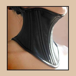 Leather neck corset posture collar, gender neutral and custom made to your size. Exquisite restriction made elegant and beautiful