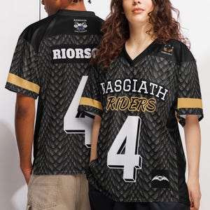 May include: A black and grey V-neck jersey featuring a dragon scale pattern, the text BASGIATH RIDERS, and the number 4 in white. The sleeves have gold bands, and the back displays the name RIORSON with the number 4 in a bold white font.