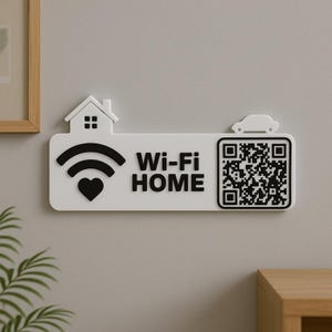 May include: White Wi-Fi Home sign with black text and graphics. The sign features a house, Wi-Fi symbol with a heart, and a car icon. A QR code is on the right side of the sign.