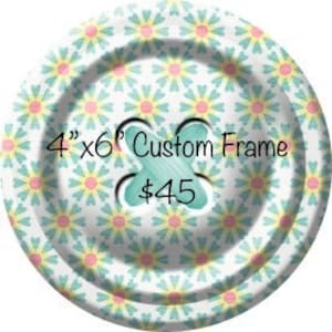 May include: A 4" x 6" custom frame with a floral pattern in shades of blue, yellow, and pink. The frame is priced at $45.