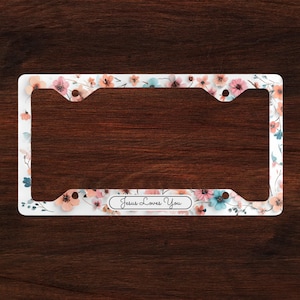 Christian Gift: Flower Border Jesus Loves You Metal License Plate Frame