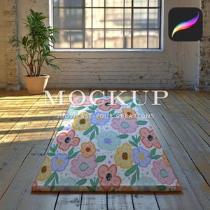 May include: A colorful floral rug with pink, yellow, blue, and green flowers on a white background. The rug is laid out on a wooden floor in a room with a window and a plant.