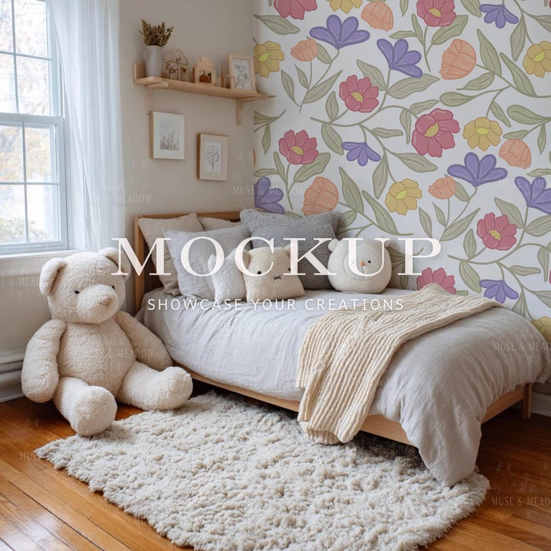 May include: A cozy bedroom scene with a wooden bed, a large teddy bear, and a fluffy rug. The wall features a floral wallpaper with pink, purple, yellow, and orange flowers. The text "MOCKUP" and "SHOWCASE YOUR CREATIONS" are visible.