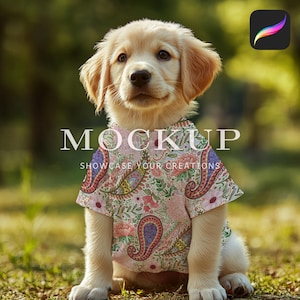 May include: A golden retriever puppy wearing a pink and white paisley patterned shirt. The shirt has a mock-up text that says "MOCKUP SHOWCASE YOUR CREATIONS".