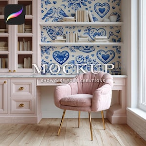 May include: A pink desk and cabinet with gold hardware and a pink velvet chair with gold legs. The background features a blue and white floral wallpaper and the text "MOCKUP SHOWCASE YOUR CREATIONS".