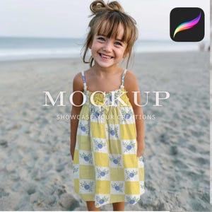 May include: A young girl smiles while wearing a yellow and white checkered dress with blue floral accents. The dress has thin straps and the text "MOCKUP SHOWCASE YOUR CREATIONS" is displayed in white across the image. The background is a sandy beach.