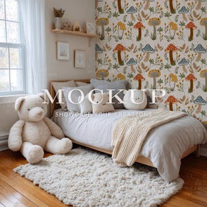 May include: A cozy bedroom scene featuring a wooden bed with light gray bedding, a cream-colored rug, and a large teddy bear. The wall is adorned with a whimsical mushroom pattern wallpaper. The text "MOCKUP SHOWCASE YOUR CREATIONS" is overlaid on the image.