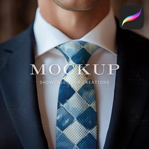 May include: A blue and white patterned tie with a geometric design. The tie is worn by a person wearing a white shirt and a dark blue suit jacket. The text "MOCKUP SHOWCASE YOUR CREATIONS" is displayed below the tie.