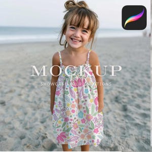 May include: A young girl smiles while wearing a white sundress with a floral pattern. The dress features pink, blue, and yellow flowers with green leaves. The text "MOCKUP SHOWCASE YOUR CREATIONS" is overlaid on the image.