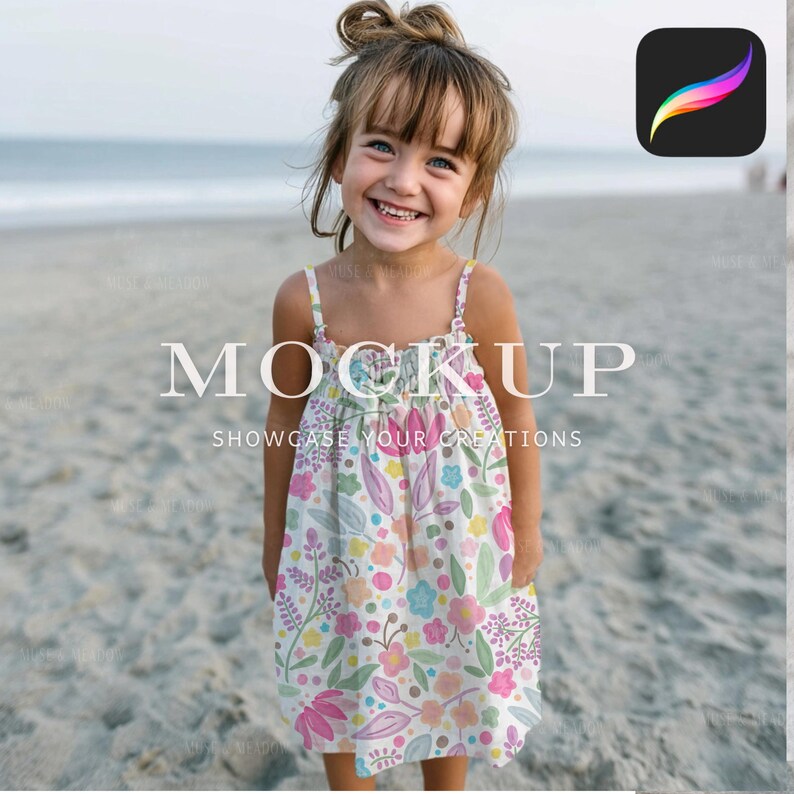 May include: A young girl smiles while wearing a white sundress with a floral pattern. The dress features pink, blue, and yellow flowers with green leaves. The text "MOCKUP SHOWCASE YOUR CREATIONS" is overlaid on the image.