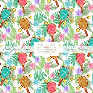 May include: A seamless pattern featuring pickleball paddles in shades of red, teal, and brown, interspersed with yellow pickleballs and colorful flowers. The design includes tropical leaves and the text "Hand Drawn Design" and "Seamless Pattern".