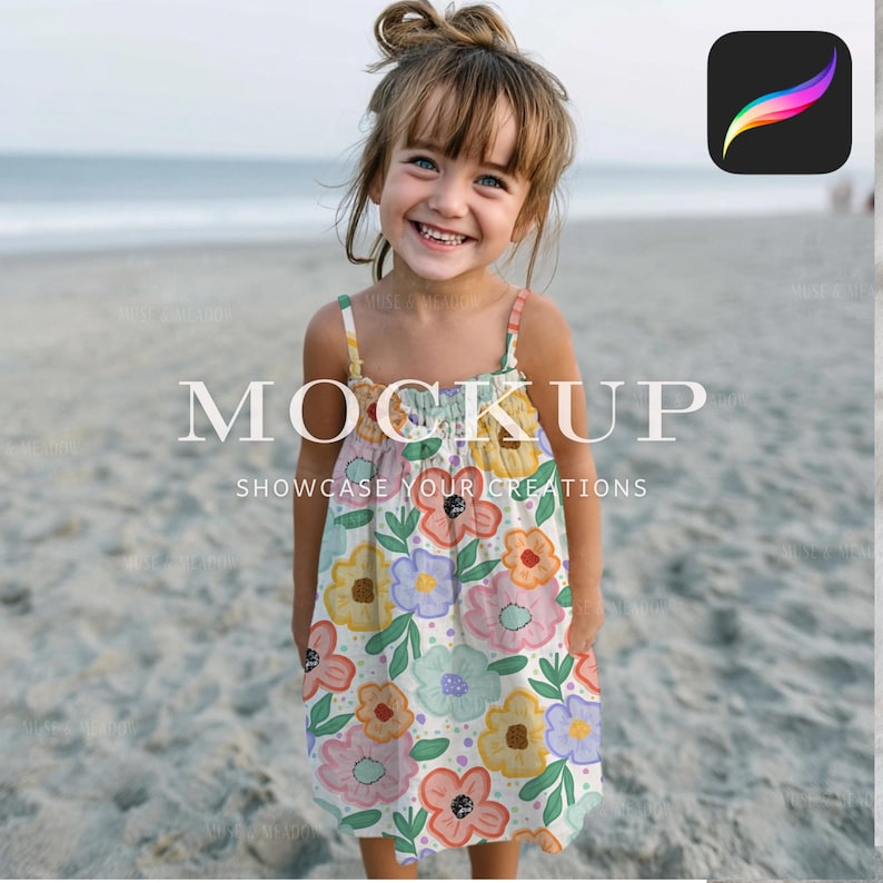 May include: A young girl smiles while wearing a white sundress with a colorful floral pattern. The dress features a variety of flowers in shades of pink, yellow, blue, and orange. The text "MOCKUP" and "SHOWCASE YOUR CREATIONS" are displayed on the dress.