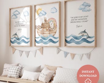 May include: Three framed art prints with watercolor illustrations. The prints feature Bible verses, dolphins, clouds, and an ark with animals. The frames are light brown, and the overall theme is inspirational and suitable for a nursery or children's room.