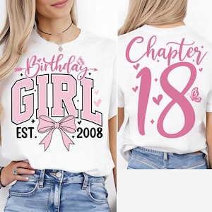 May include: White t-shirt with pink text and graphics. The front says "Birthday GIRL EST. 2008" with a bow and butterfly. The back says "Chapter 18" with a large number 18 and butterfly.