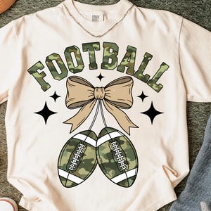 Preppy Camo Football PNG, Coquette Bow & Cherry Game Day Design, Trendy Distressed Camouflage Shirt Sublimation for Moms, Football Season